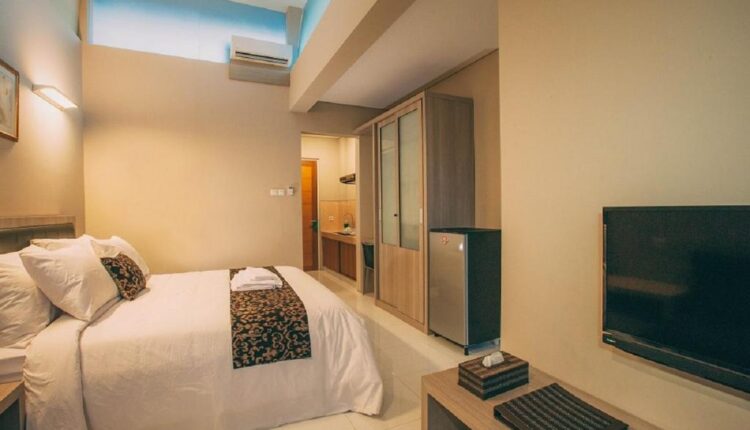Kamar tamu di Bali True Living Denpasar 