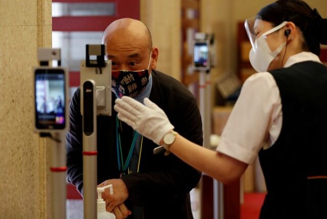 Ilustrasi face id yang berlaku di Jepang. Foto: Issei Kato/REUTERS