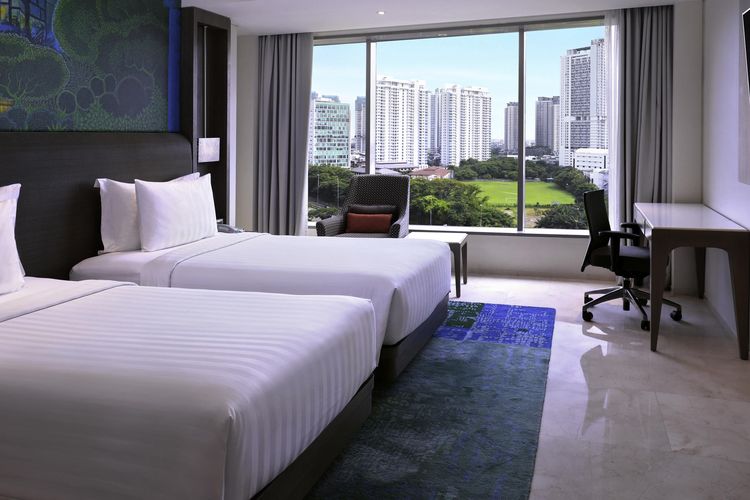 Ilustrasi salah satu kamar hotel Grand Mercure Jakarta Kemayoran di Jakarta Pusat.(Dok. Grand Mercure Jakarta Kemayoran)