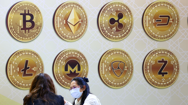 Ilustrasi mata uang kripto. Foto: REUTERS/Ann Wang